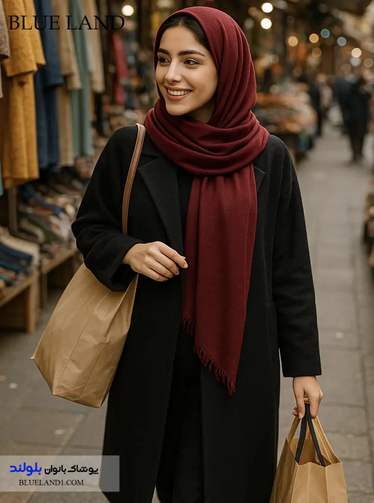 مانتوی مشکی بلند پاییز 1404 با شال زرشکی در بازار ایران